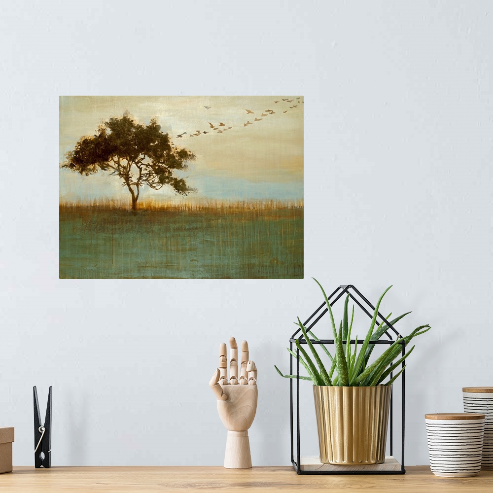 A bohemian room featuring Abstract painting of a tree in a field with birds flying out of it with a grungy texture layered ...