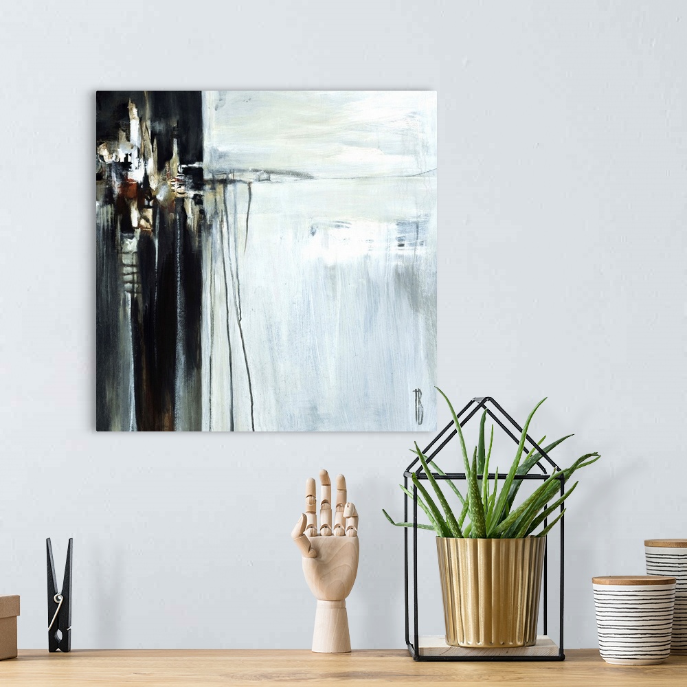 A bohemian room featuring Contemporary abstract painting using dark contrasting neutral tones.