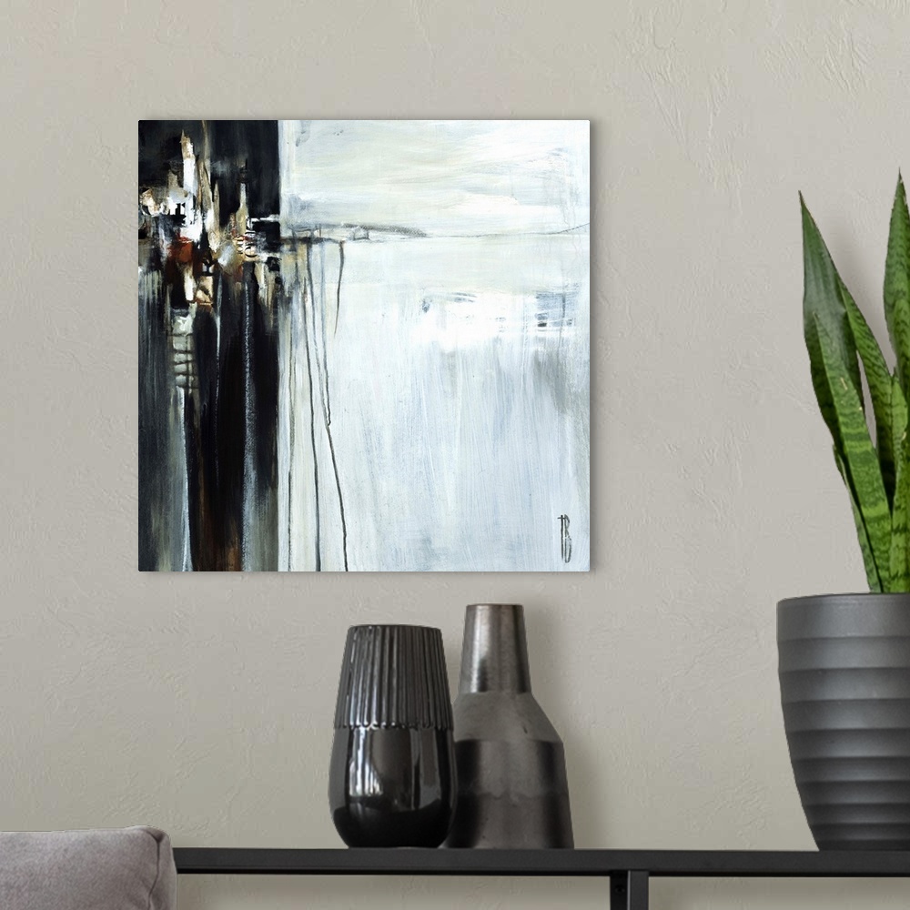 A modern room featuring Contemporary abstract painting using dark contrasting neutral tones.