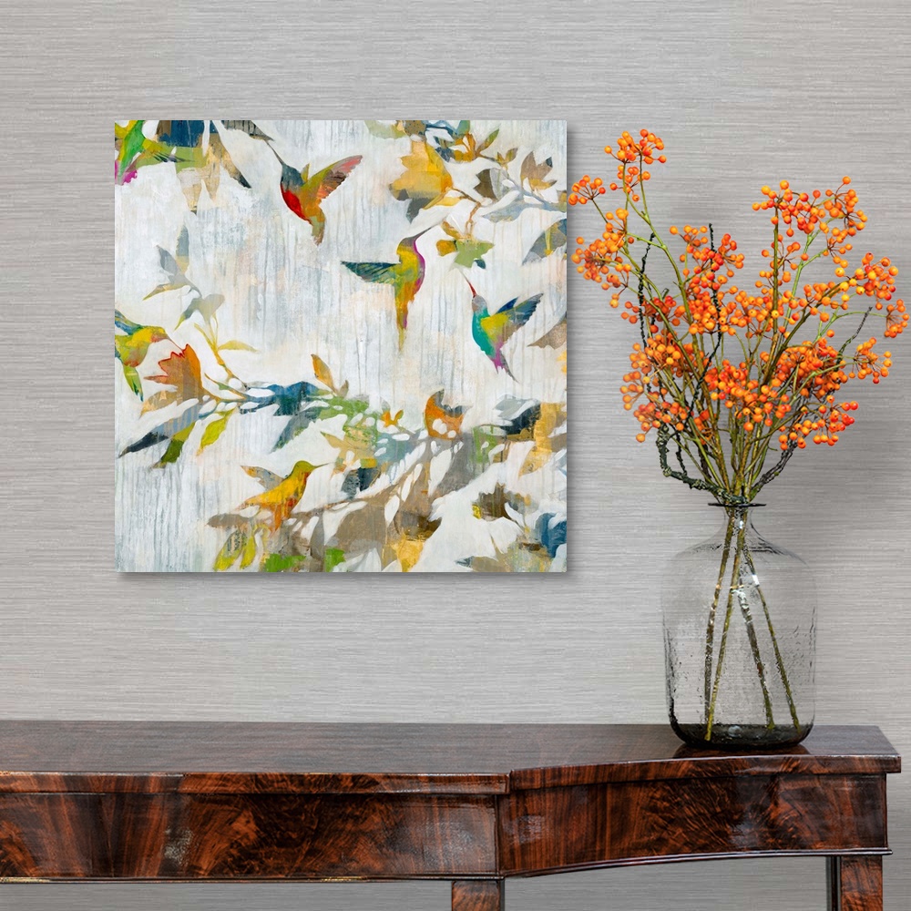 A traditional room featuring Contemporary abstract painting of a hummingbirds in multiple colors.