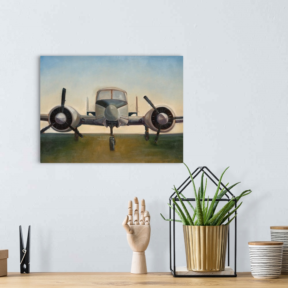 A bohemian room featuring A painting of an airplane preparing to take off on a runway.