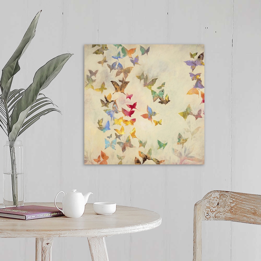 A farmhouse room featuring Contemporary painting of fluttering butterflies in a spectrum of colors against a cream background.