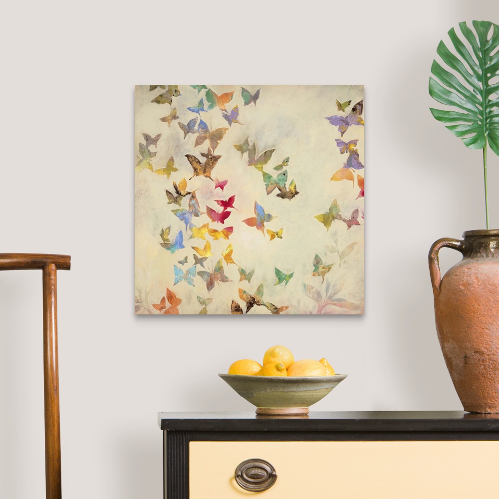A traditional room featuring Contemporary painting of fluttering butterflies in a spectrum of colors against a cream background.
