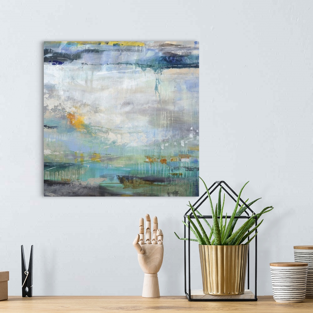 A bohemian room featuring Abstract painting using cool tones and textures to create what looks like water.