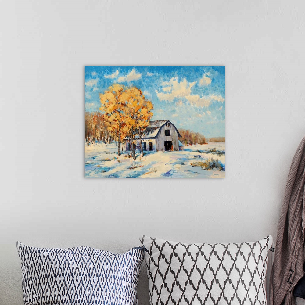 A bohemian room featuring A transitional style painting on a white barn and free with golden leaves in a snowy winter lands...