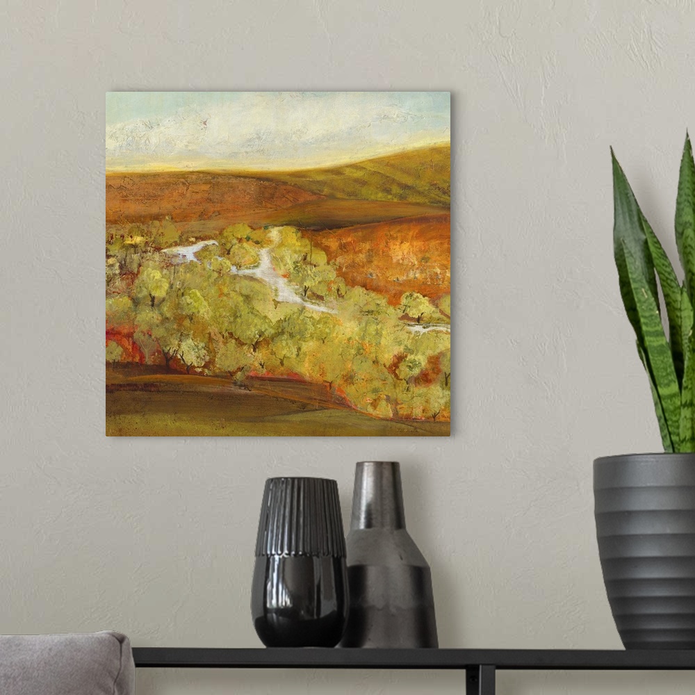 A modern room featuring Contemporary landscape painting looking out over autumn countryside.