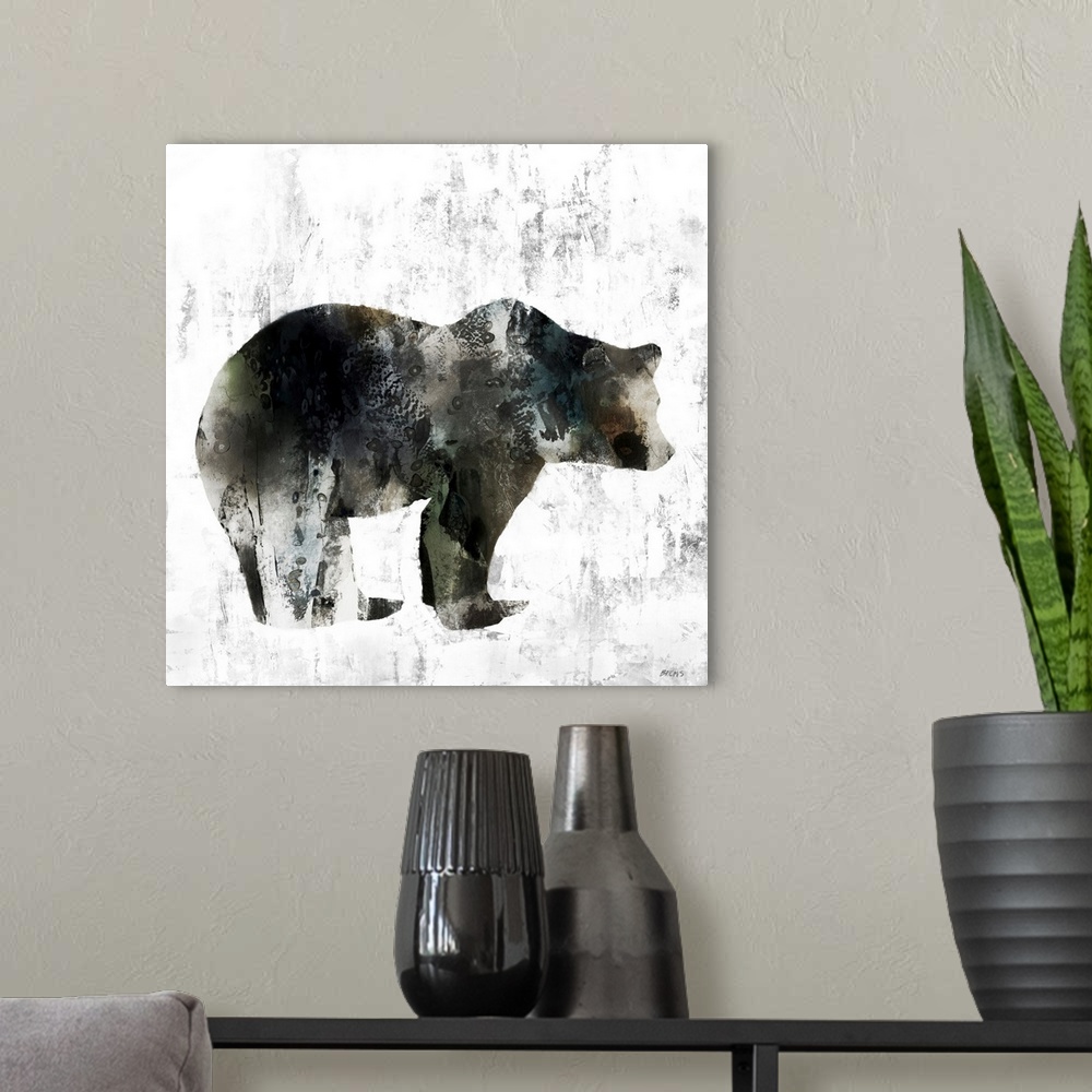 A modern room featuring A simple stylized image of a bear that is both rustic and contemporary, in textured neutral shade...