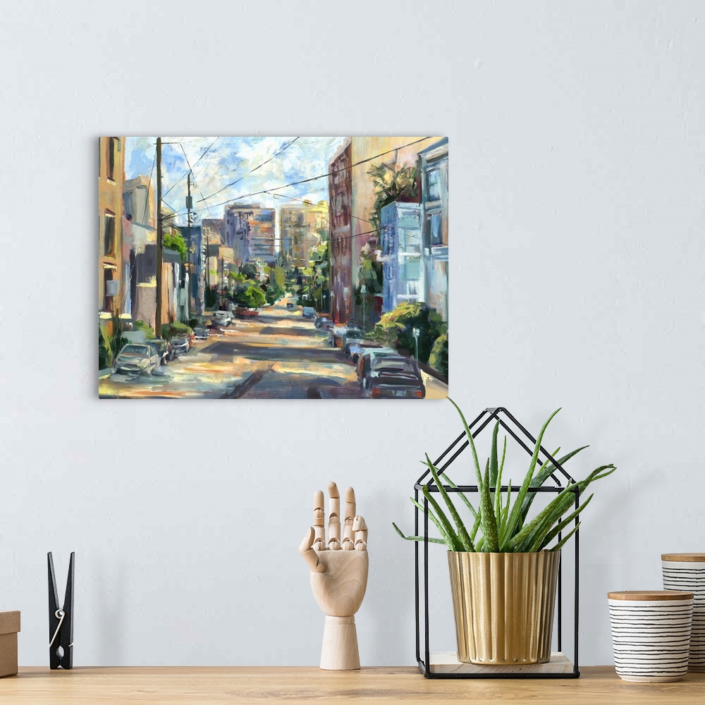 A bohemian room featuring Contemporary painting looking down a city street.
