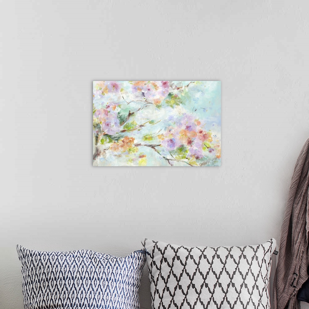 A bohemian room featuring Contemporary painting of soft pink and purple flowers on a tree branch.