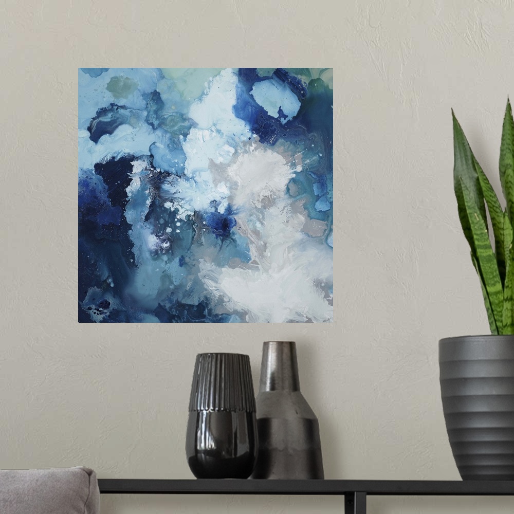 A modern room featuring Contemporary abstract painting using blue tones swirling around to create a flowing cloud like form.