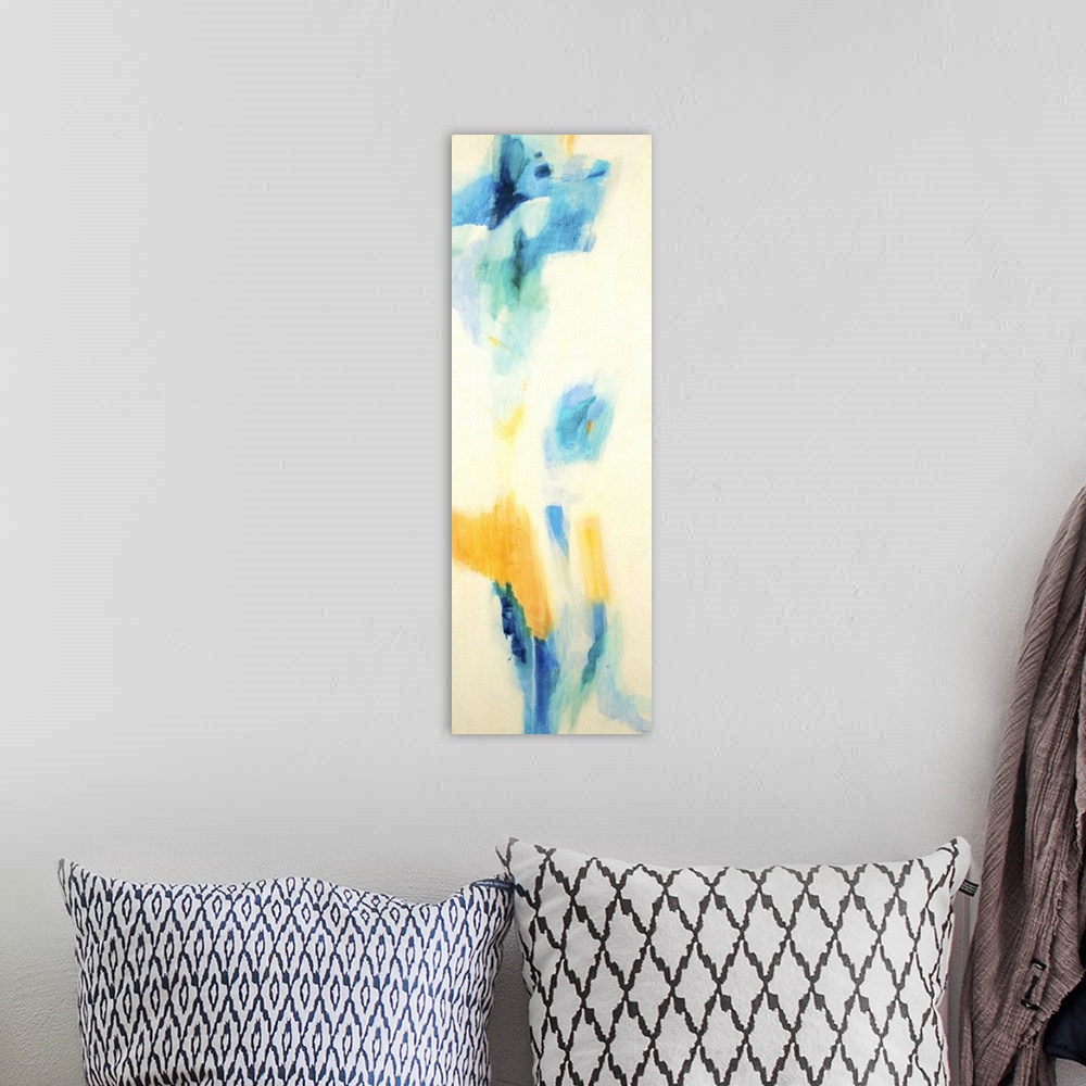 A bohemian room featuring Contemporary abstract painting using splashes of blue and yellow against a beige background.