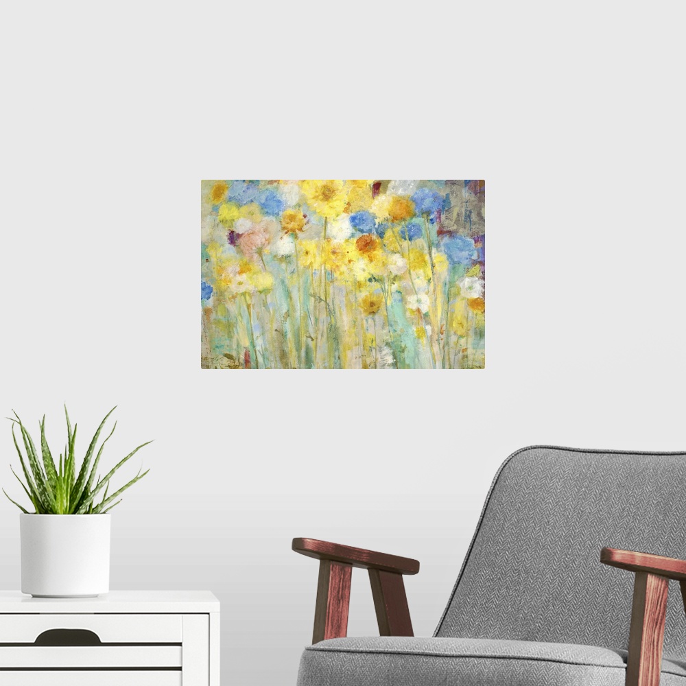 A modern room featuring A contemporary painting of a garden of blue and yellow flowers.