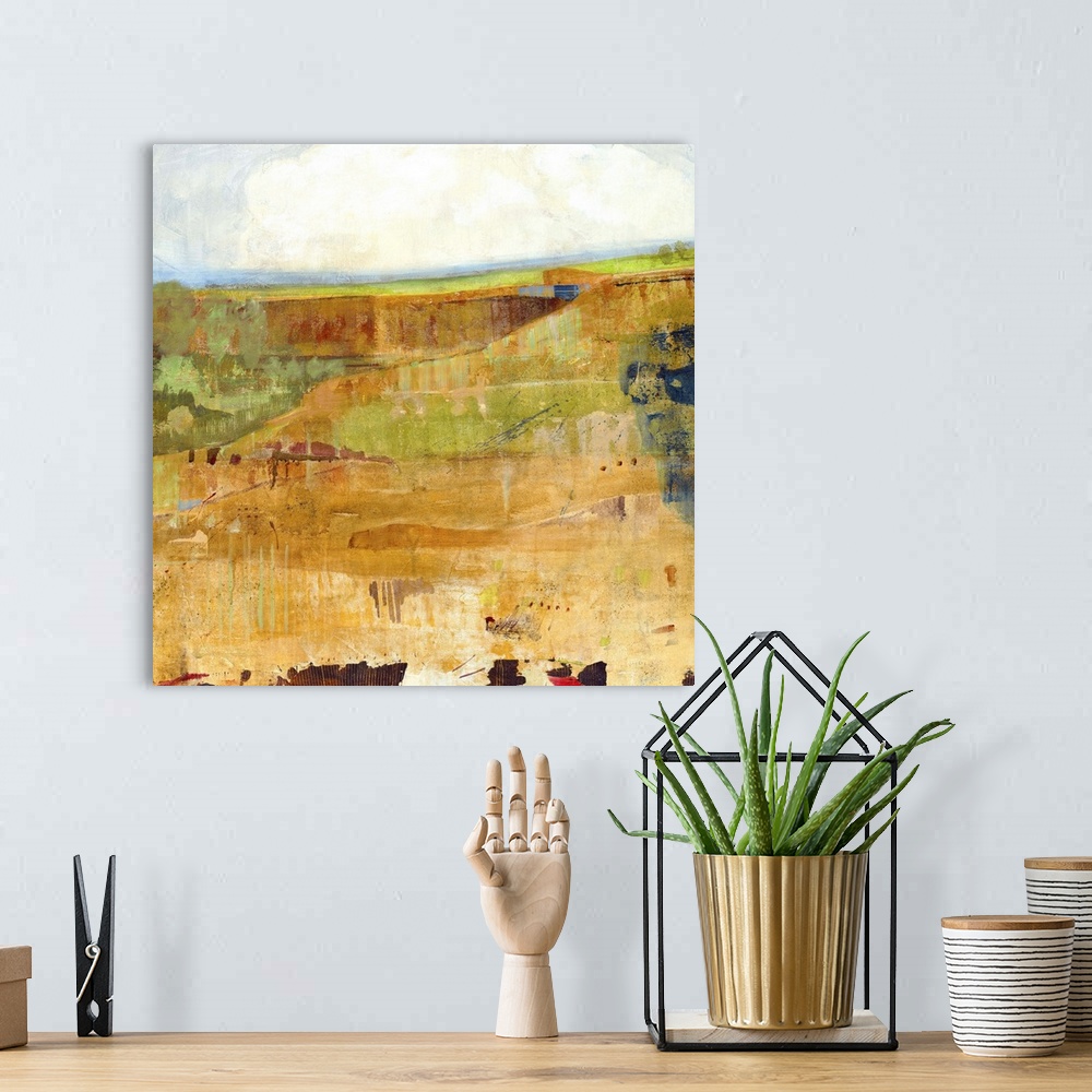 A bohemian room featuring Contemporary landscape painting looking out over a canyon.
