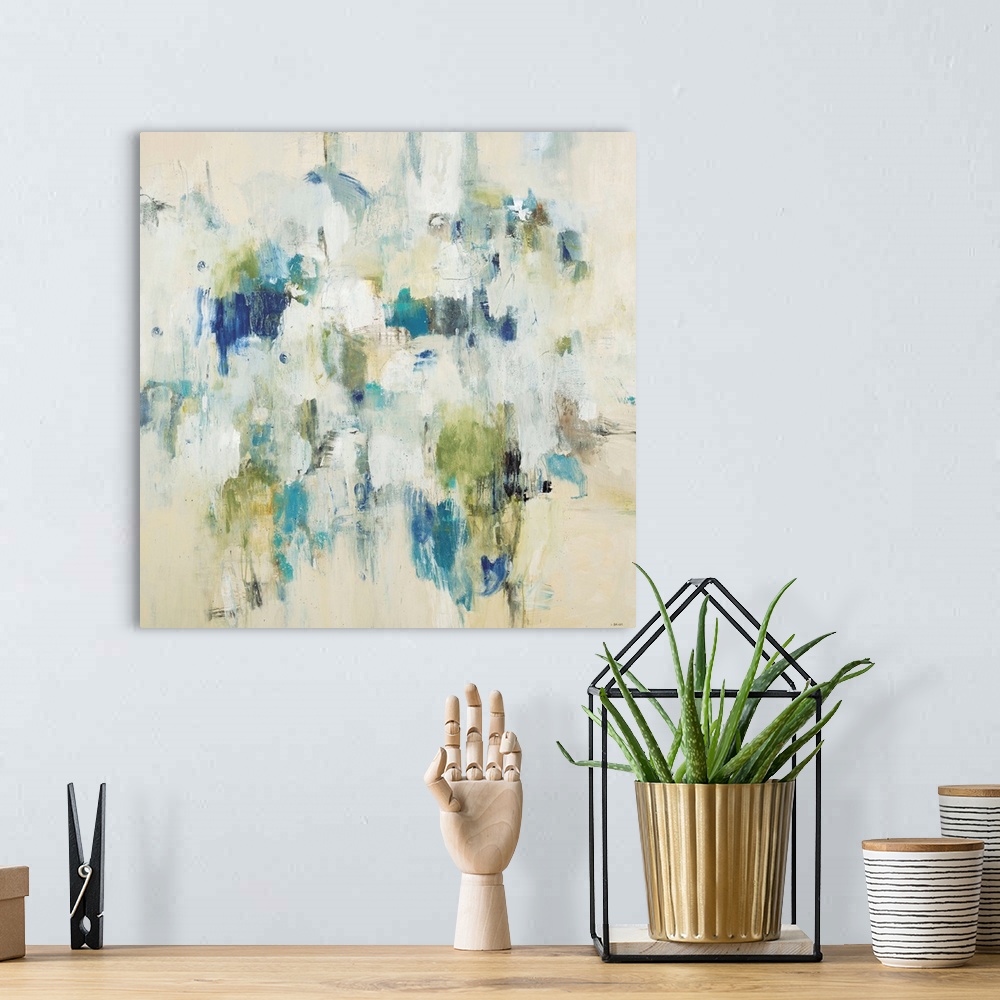 A bohemian room featuring Beige abstract contemporary artwork using splashes of bright color.