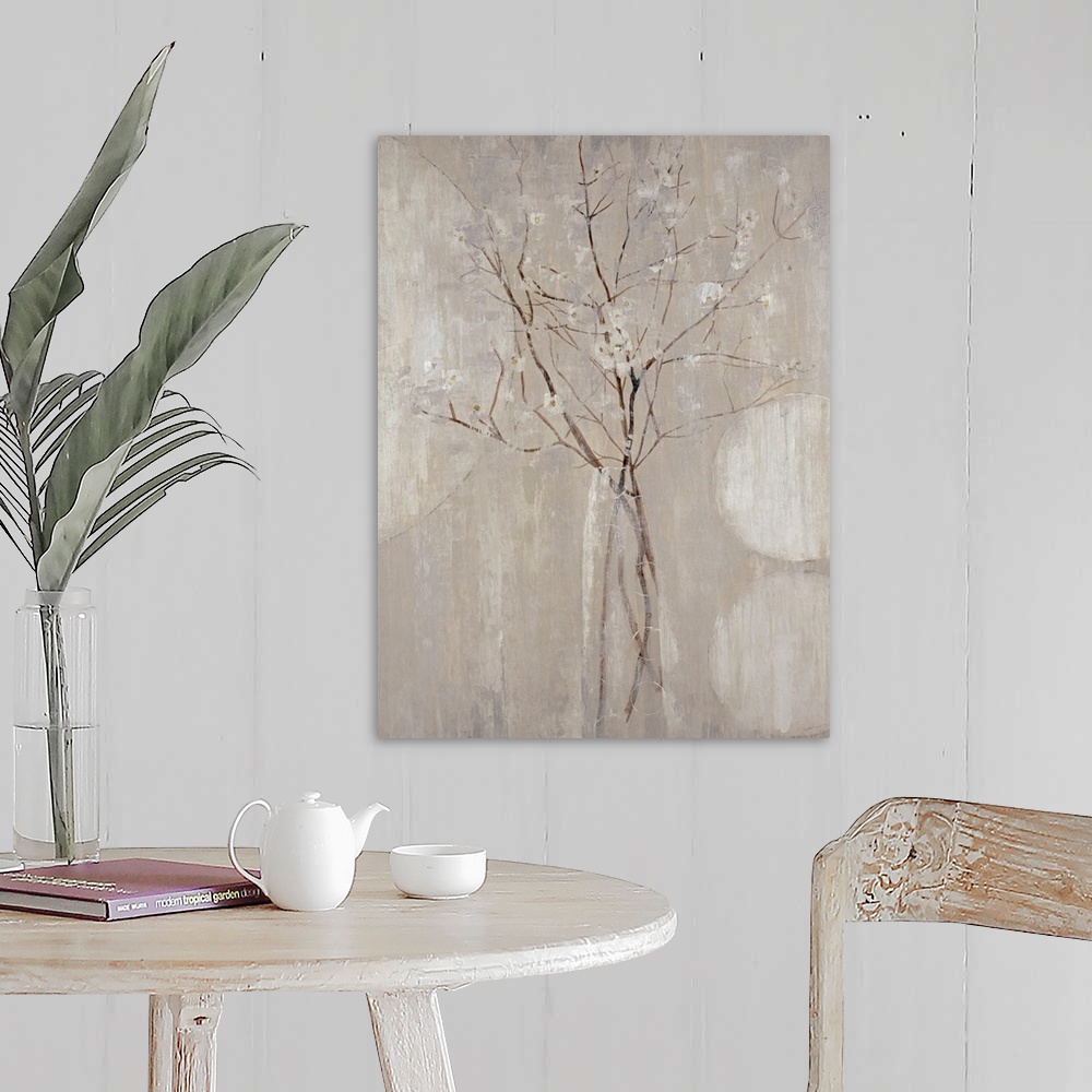 A farmhouse room featuring A monochromatic vertical painting of  twigs with tiny flowers.