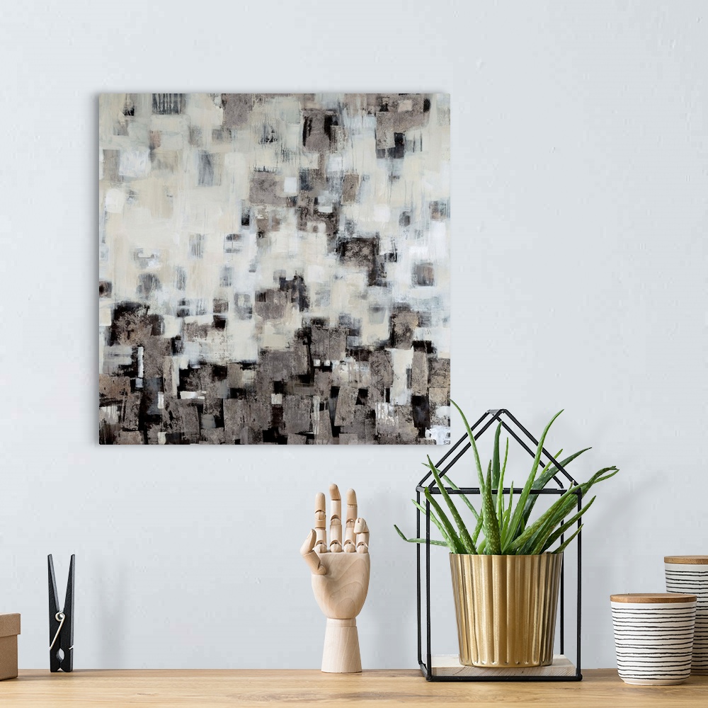 A bohemian room featuring Contemporary abstract painting using geometric forms.