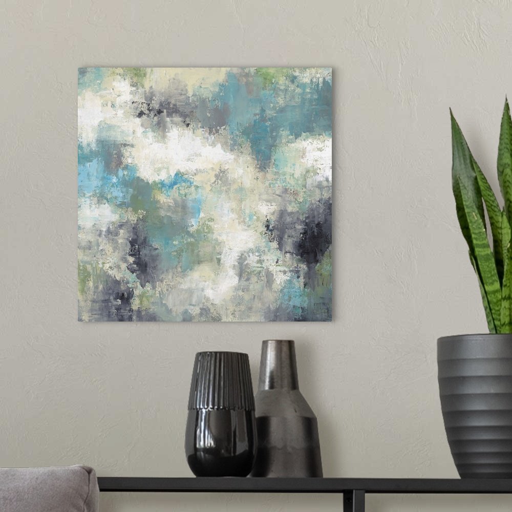 A modern room featuring Contemporary abstract painting using a variety of blue tones mixed with neutral tones.