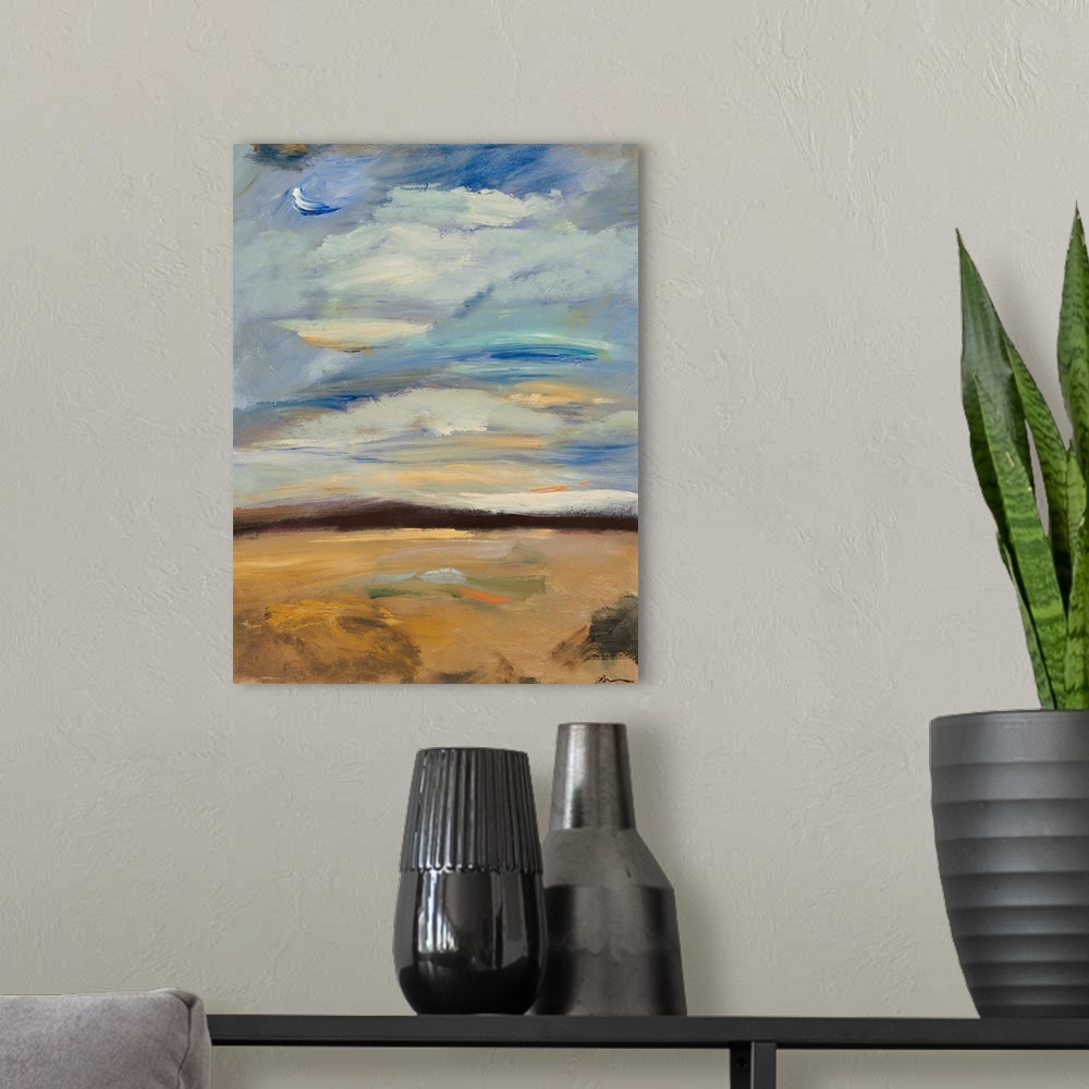 A modern room featuring Contemporary abstract painting of a plains landscape under a blue cloudy sky.