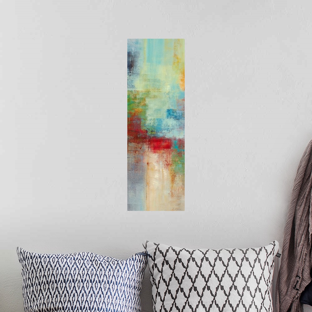 A bohemian room featuring A narrow piece of abstract artwork that is filled with mostly cool blocks of colors and a pop of ...