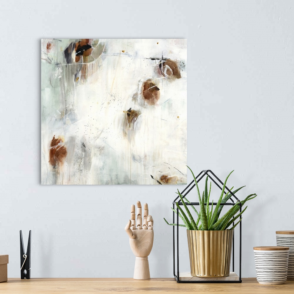A bohemian room featuring A contemporary abstract painting using splashes of brown against a neutral background.