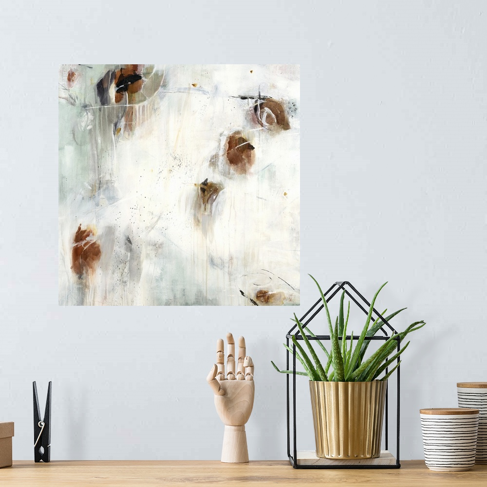 A bohemian room featuring A contemporary abstract painting using splashes of brown against a neutral background.
