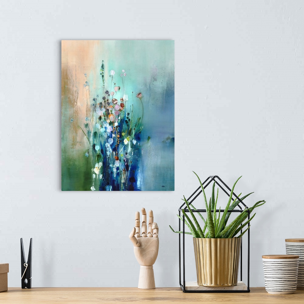 A bohemian room featuring A contemporary abstract painting that resembles a bunch of tall wildflowers on a green and blue b...