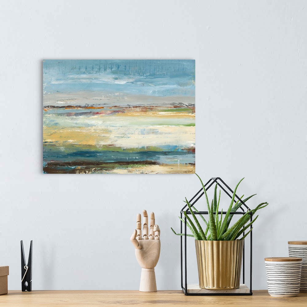 A bohemian room featuring Abstract painting representing a beach landscape with blue, green, orange, brown, yellow, gray, a...