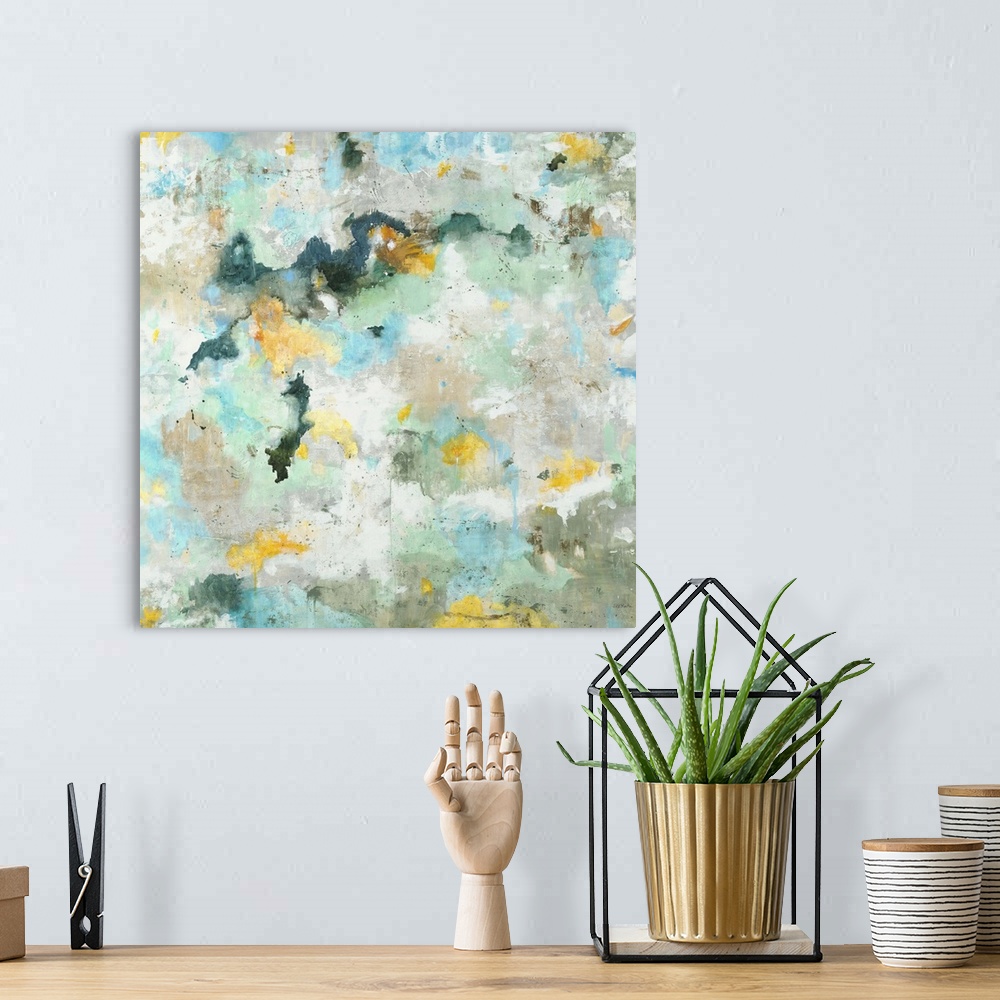 A bohemian room featuring A contemporary abstract painting using aqua and yellow tones.