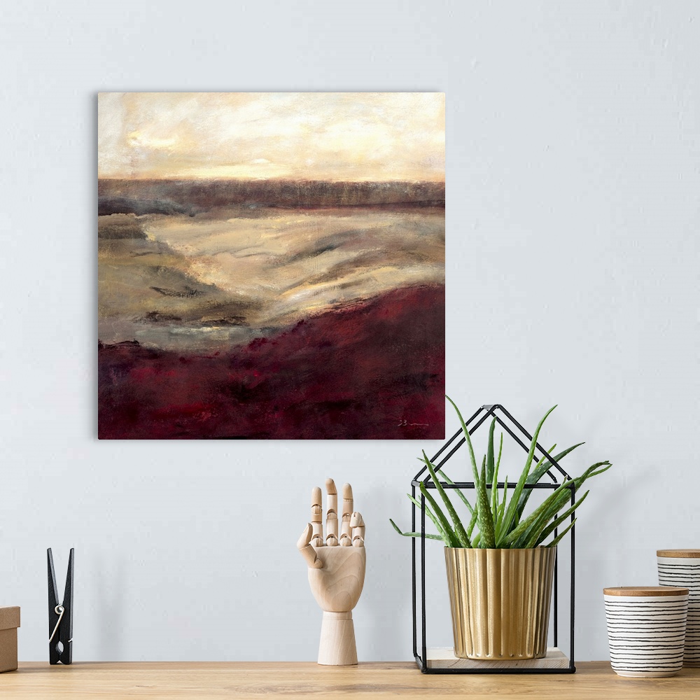 A bohemian room featuring Contemporary abstract painting using warm tones resembling a landscape.
