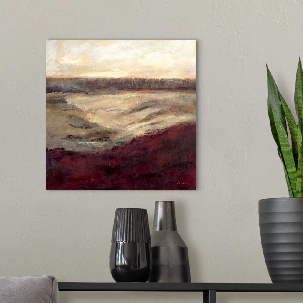 A modern room featuring Contemporary abstract painting using warm tones resembling a landscape.