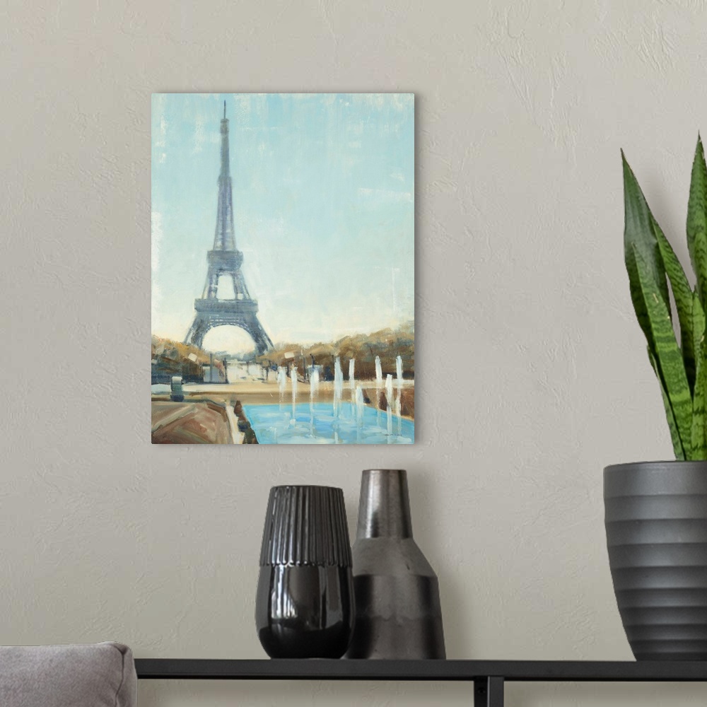 A modern room featuring Contemporary painting of the Eiffel tower viewed from the ground level.