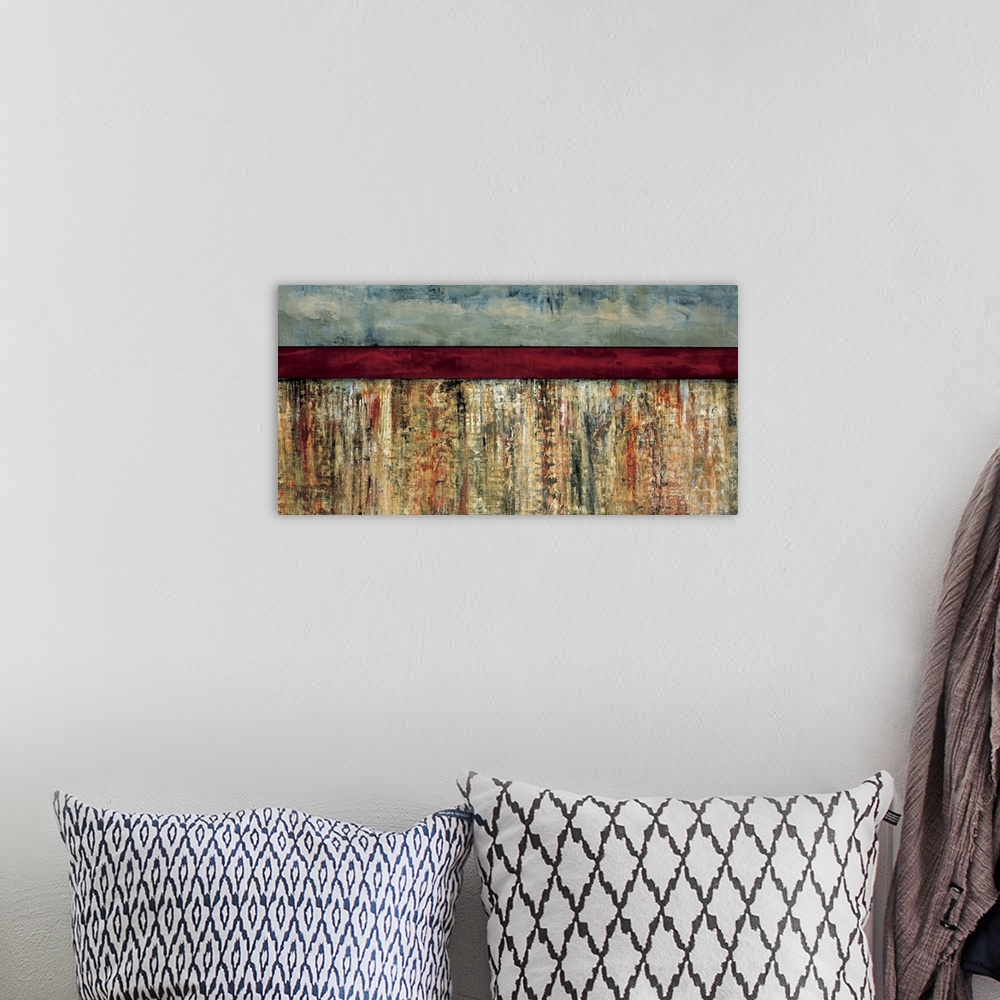 A bohemian room featuring Abstract painting using earth colors in a textured color field, with a dark red horizontal stripe...