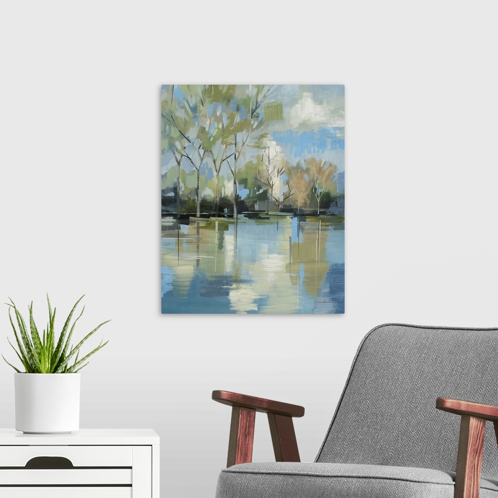 A modern room featuring A serene contemporary painting of trees behind a lake painted in a blocky abstract style