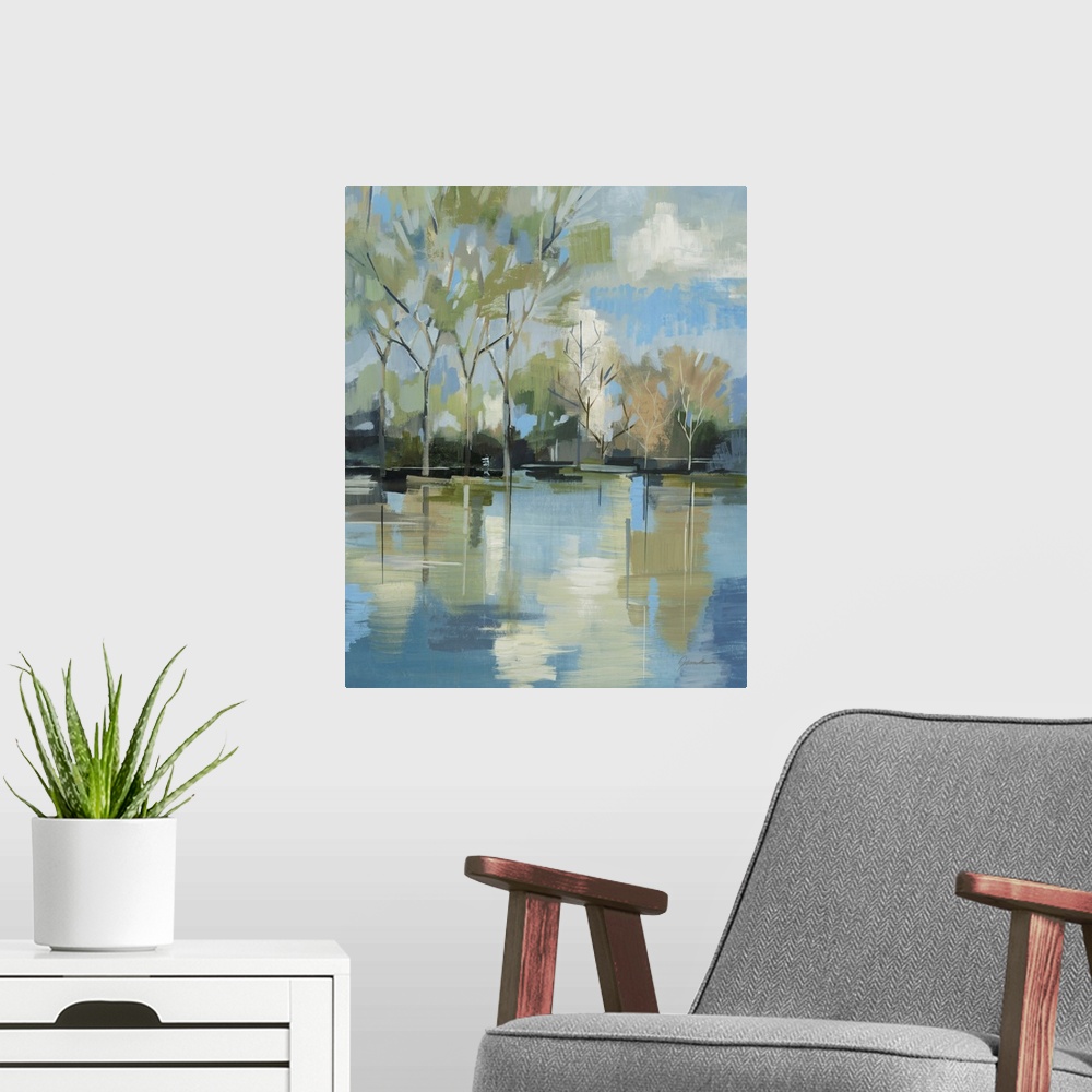A modern room featuring A serene contemporary painting of trees behind a lake painted in a blocky abstract style