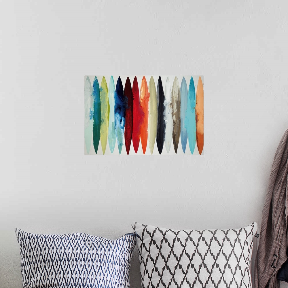 A bohemian room featuring Contemporary abstract painting using oblong shapes in various colors.