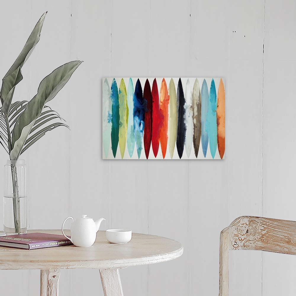 A farmhouse room featuring Contemporary abstract painting using oblong shapes in various colors.