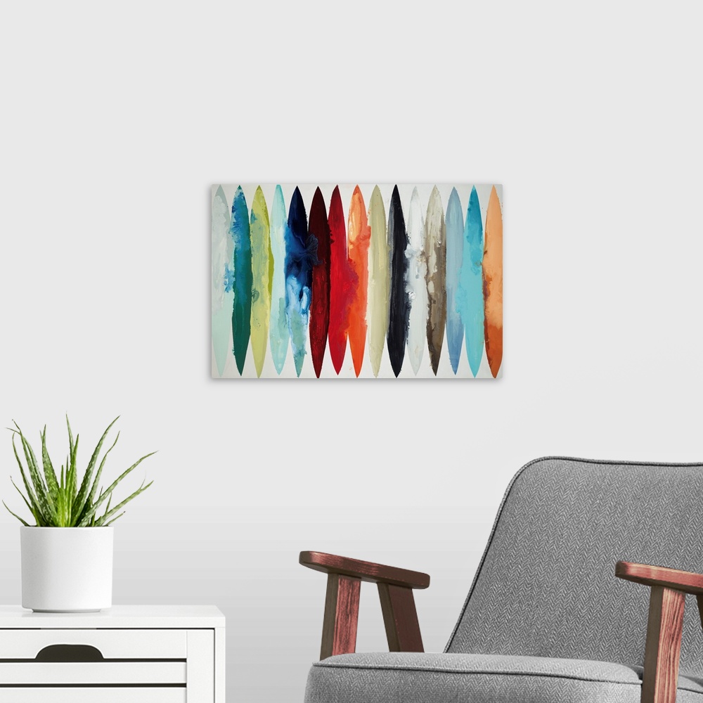 A modern room featuring Contemporary abstract painting using oblong shapes in various colors.