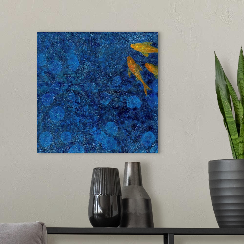 A modern room featuring Square painting with textured, deep blue water and three orange koi fish in the top right corner.