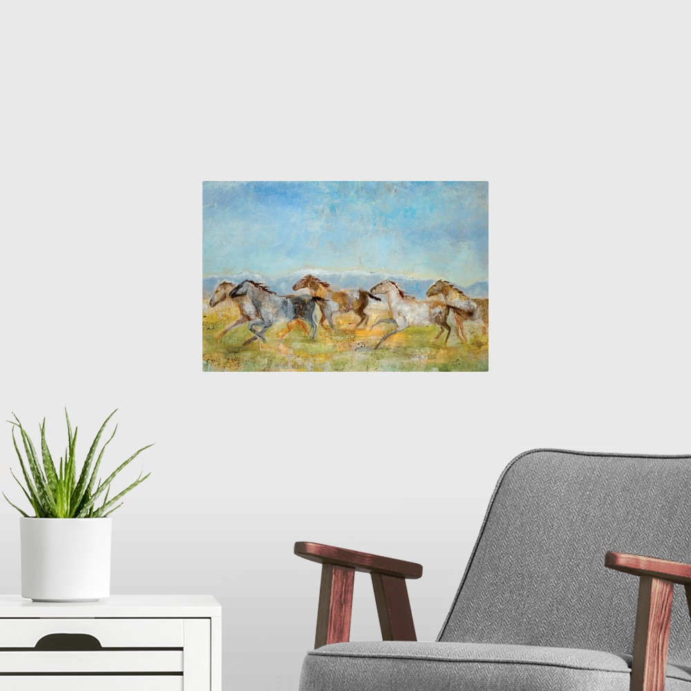 A modern room featuring A landscape painting of wild horses running across the plains; the horses have been painted with ...