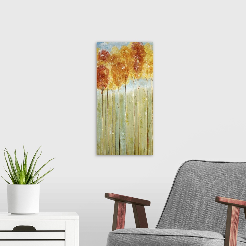 A modern room featuring A contemporary painting of tall trees on thin trunks with autumn foliage.