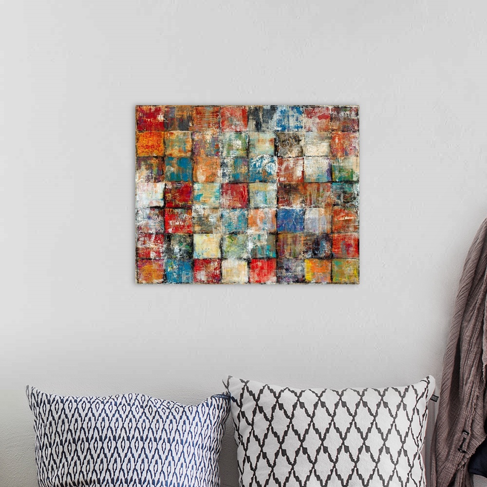 A bohemian room featuring Contemporary abstract painting of distressed multicolored squares lined up in a grid pattern.