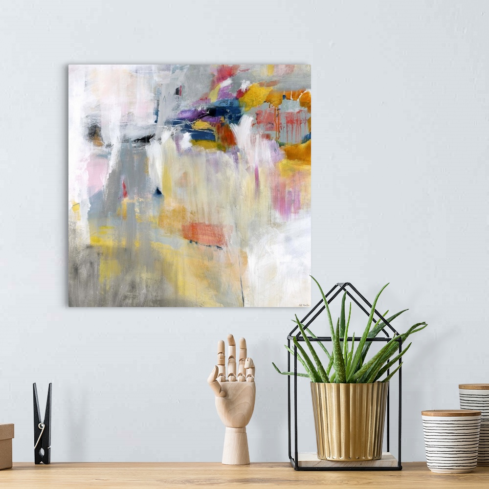 A bohemian room featuring Contemporary abstract painting using tones of orange blue and pink against a multi-toned gray bac...