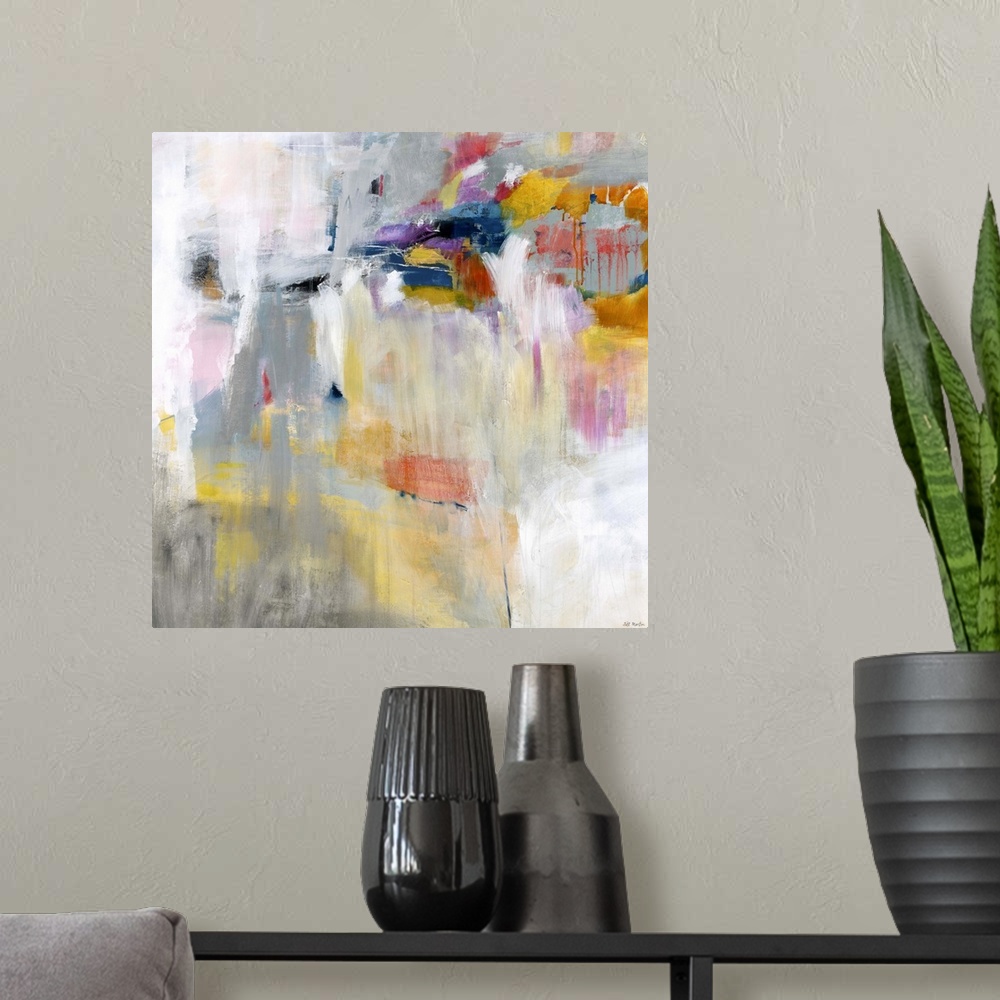 A modern room featuring Contemporary abstract painting using tones of orange blue and pink against a multi-toned gray bac...