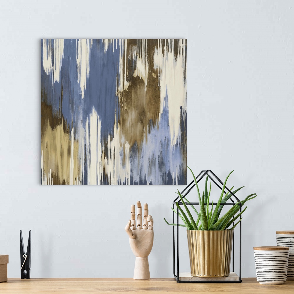 A bohemian room featuring Abstract artwork with pale colors that drip downward across this large print.