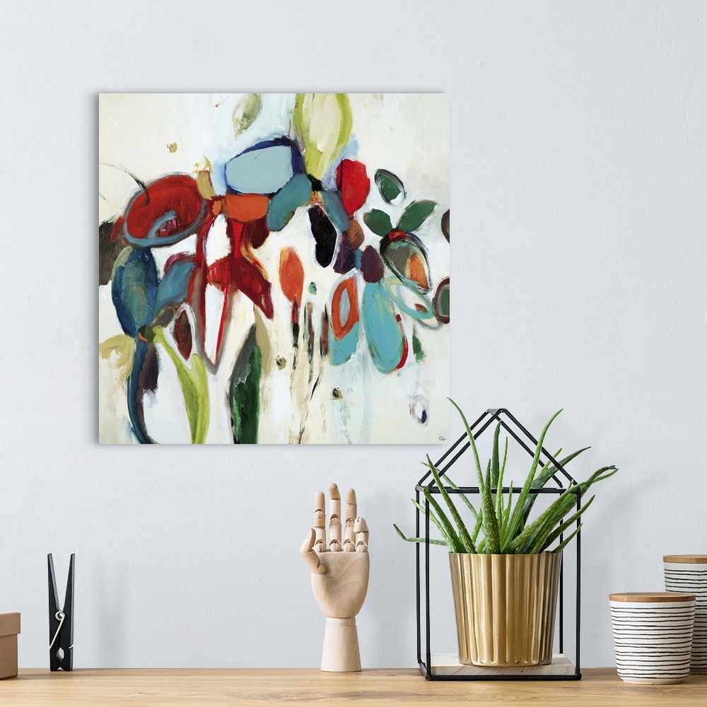 A bohemian room featuring Abstract painting of organic shapes in multiple and vivid colors arranged like a bouquet of flowers.