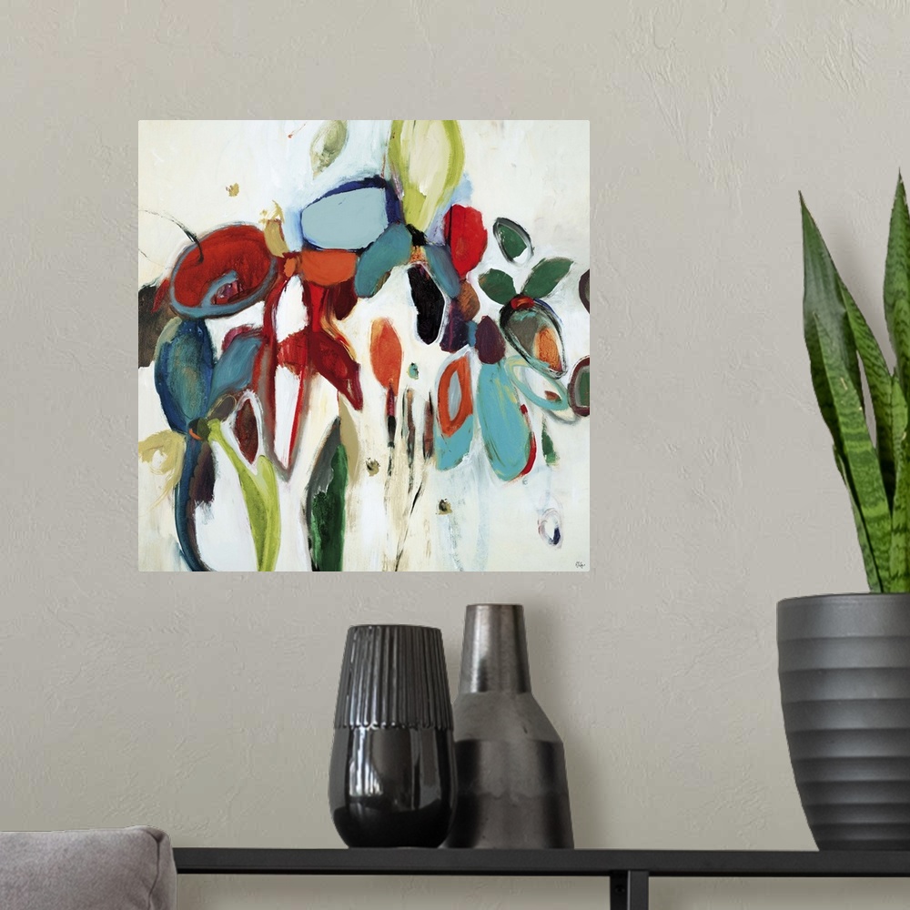 A modern room featuring Abstract painting of organic shapes in multiple and vivid colors arranged like a bouquet of flowers.