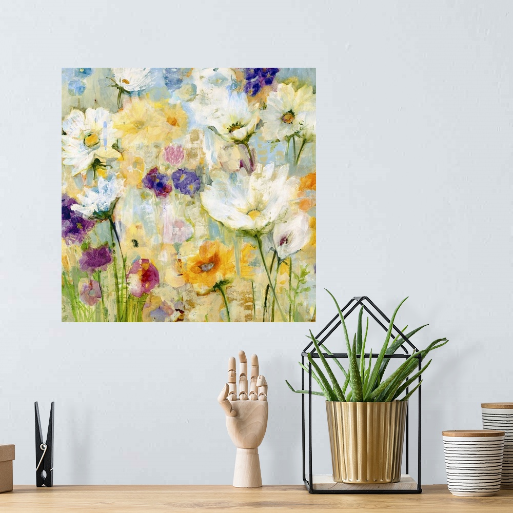 A bohemian room featuring A painting of garden flowers in shades of yellow, orange and purple.