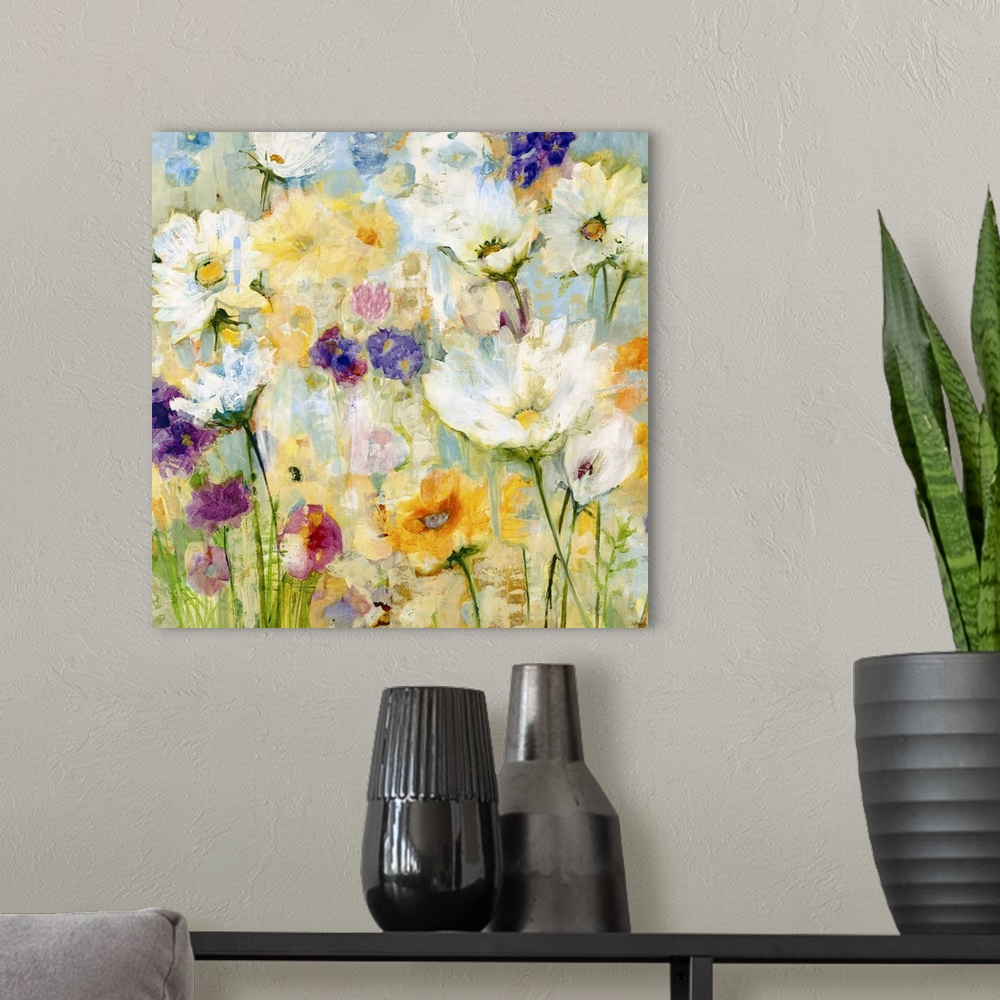 A modern room featuring A painting of garden flowers in shades of yellow, orange and purple.