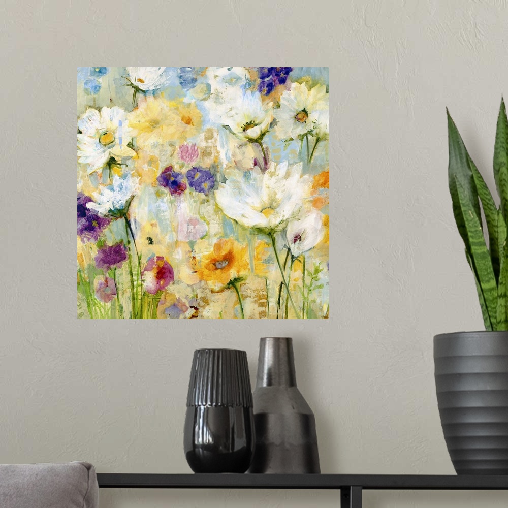A modern room featuring A painting of garden flowers in shades of yellow, orange and purple.