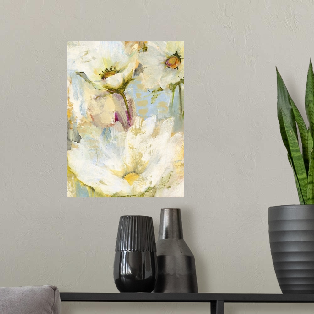 A modern room featuring A decorative floral painting in bright, warm yellow tones.
